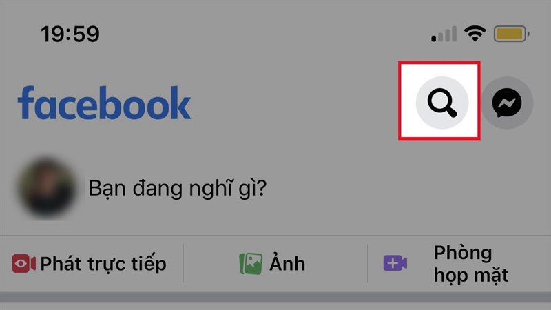 alt text: Biểu tượng kính lúp trên ứng dụng Facebook