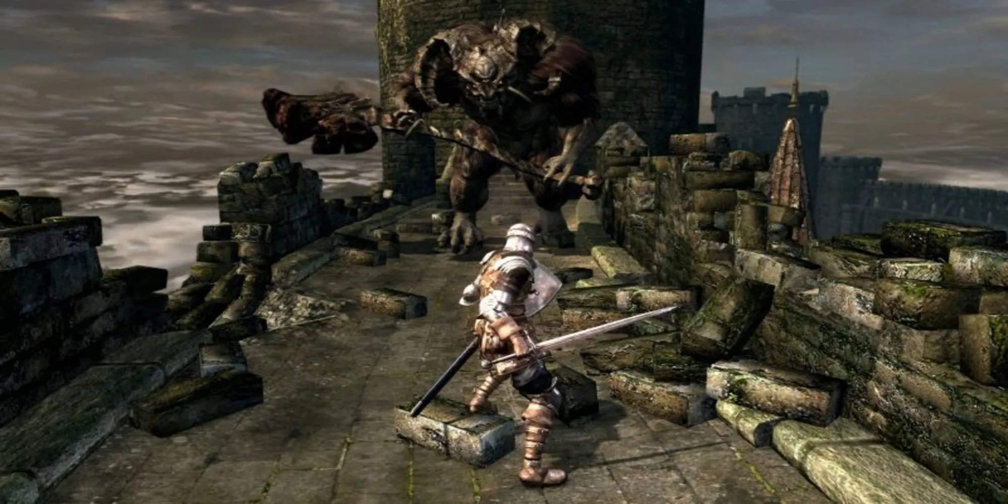 Cảnh chiến đấu của một nhân vật trong Dark Souls đối mặt với Asylum Demon