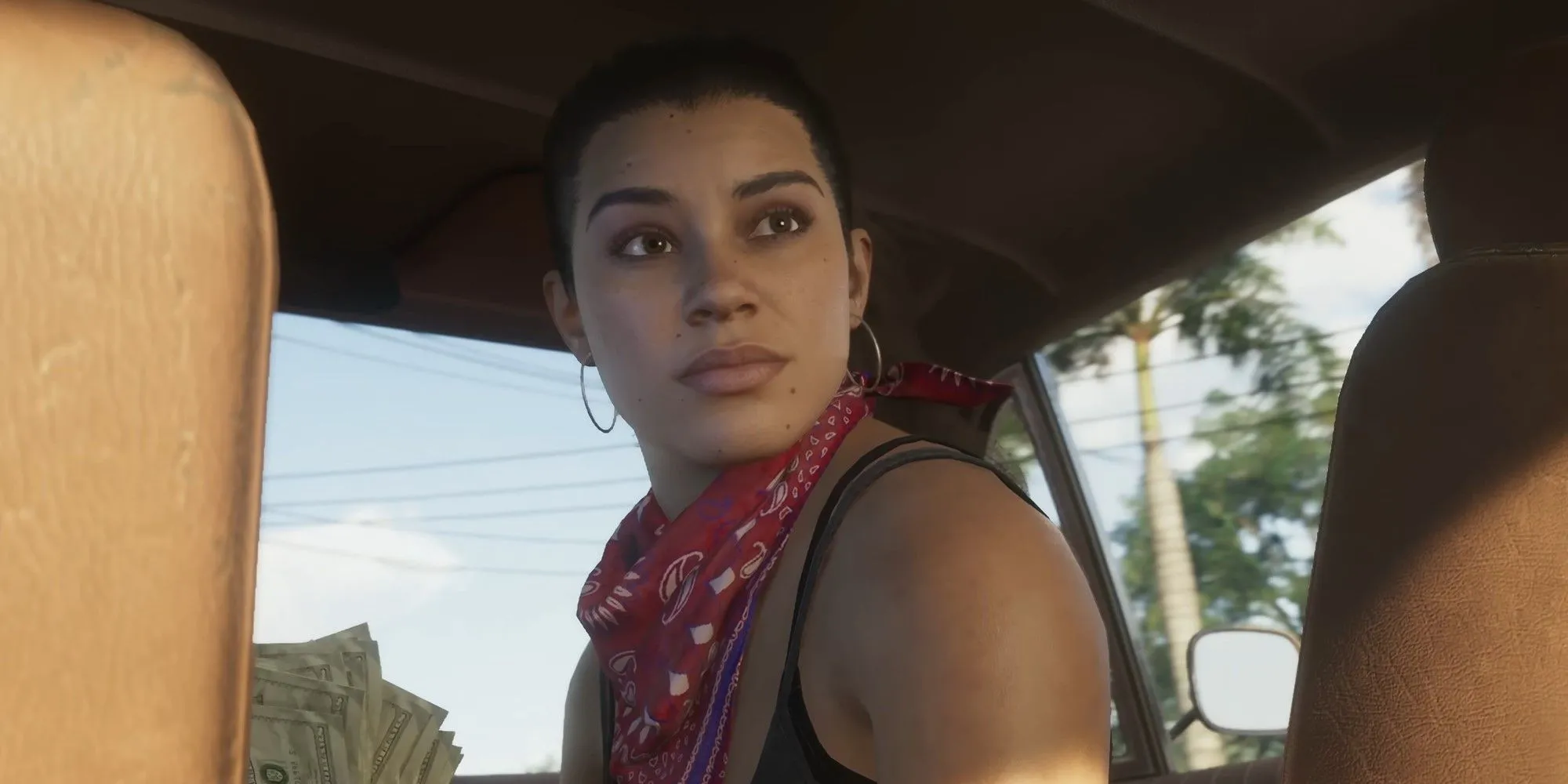 Cảnh trong trailer đầu tiên của GTA 6 với hai nhân vật chính Lucia và Jason trên xe mui trần