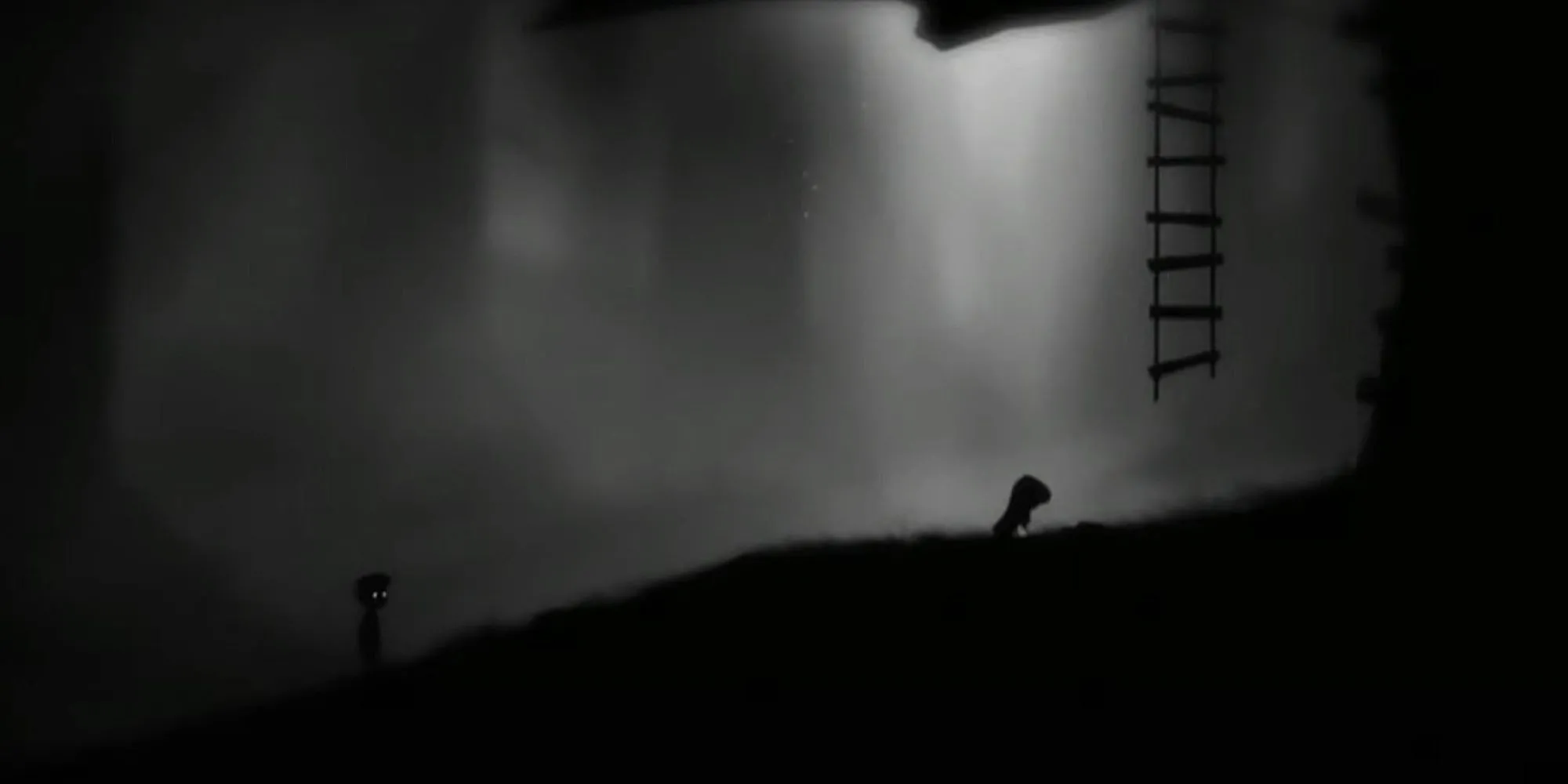 Hình ảnh u ám đặc trưng của game Limbo với cậu bé và con nhện khổng lồ