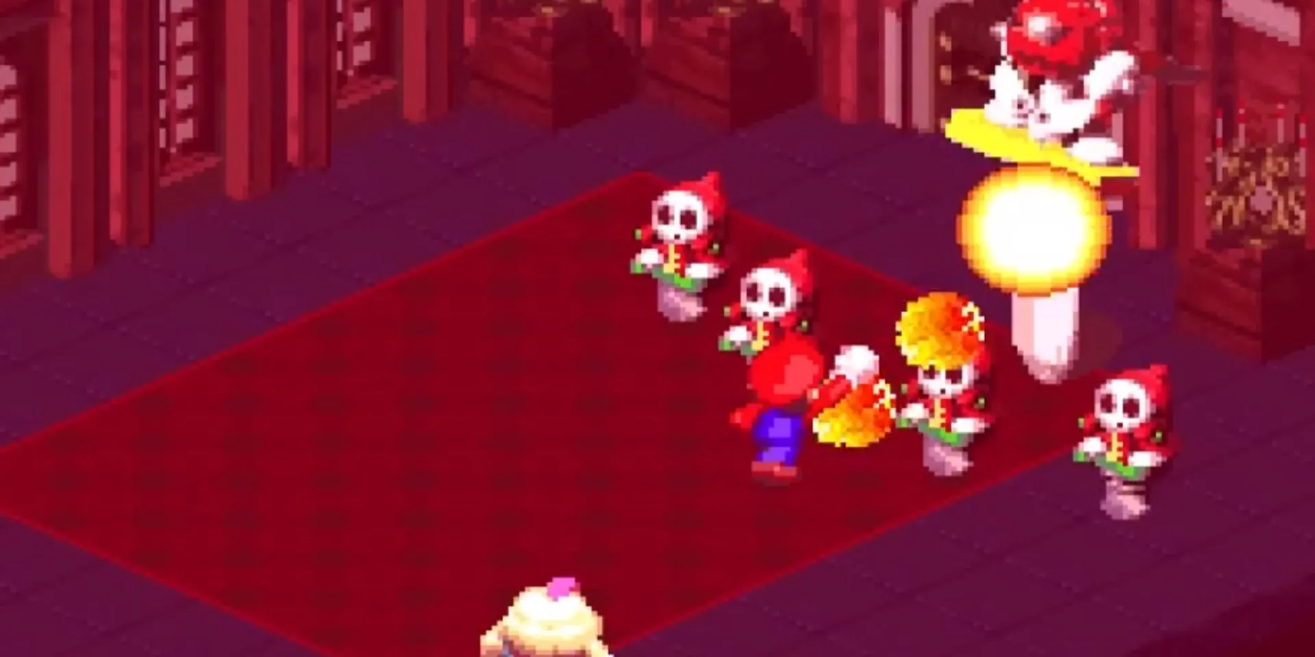 Mario sử dụng chiêu Thần Hỏa Cầu tấn công Mack trong Super Mario RPG