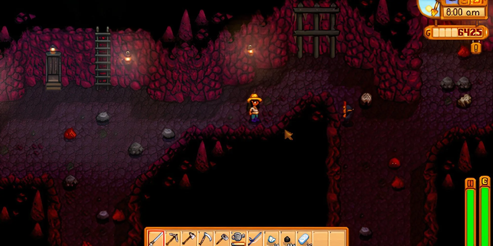 Nhân vật người chơi đang chiến đấu với quái vật trong hầm mỏ tối tăm của Stardew Valley.