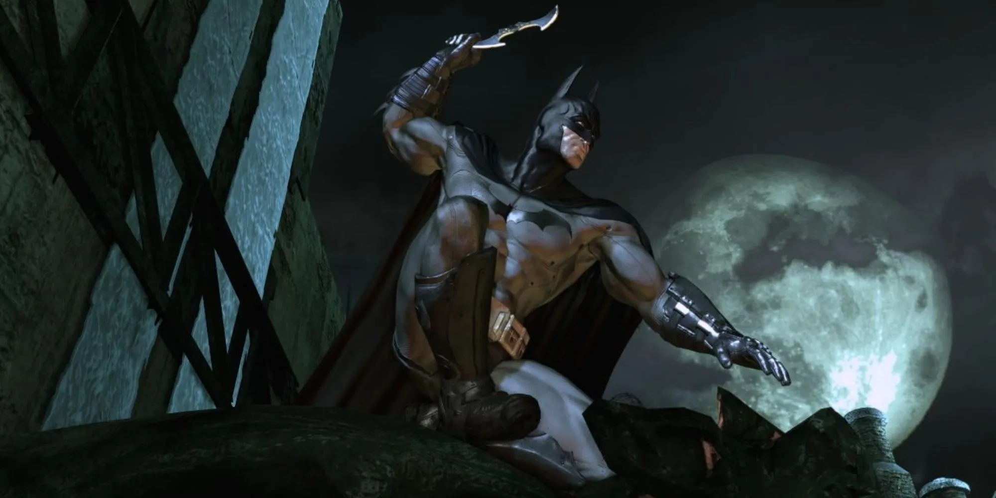 Batman đang đứng trong một hành lang u tối của Arkham Asylum