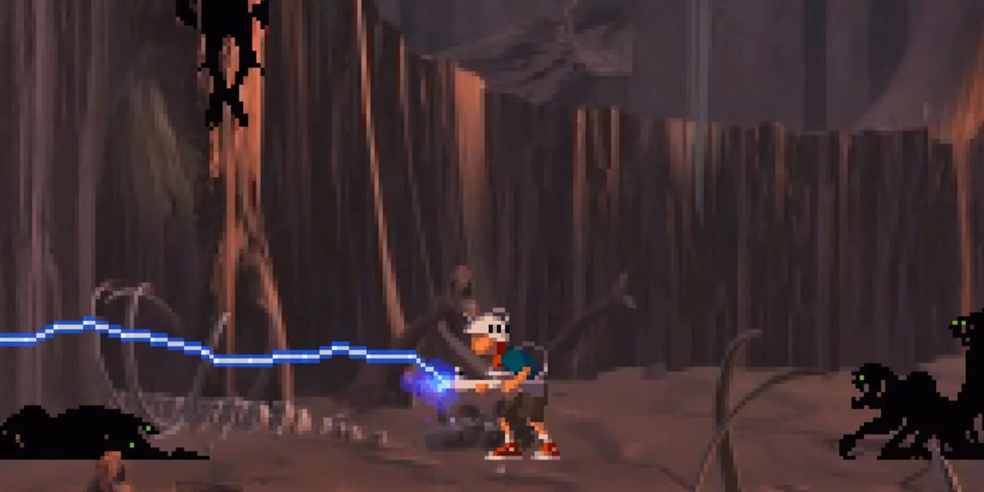 Cảnh nhân vật chính Andy trong Heart of Darkness chiến đấu với quái vật bóng tối, minh họa đồ họa và gameplay của game PS1 này.