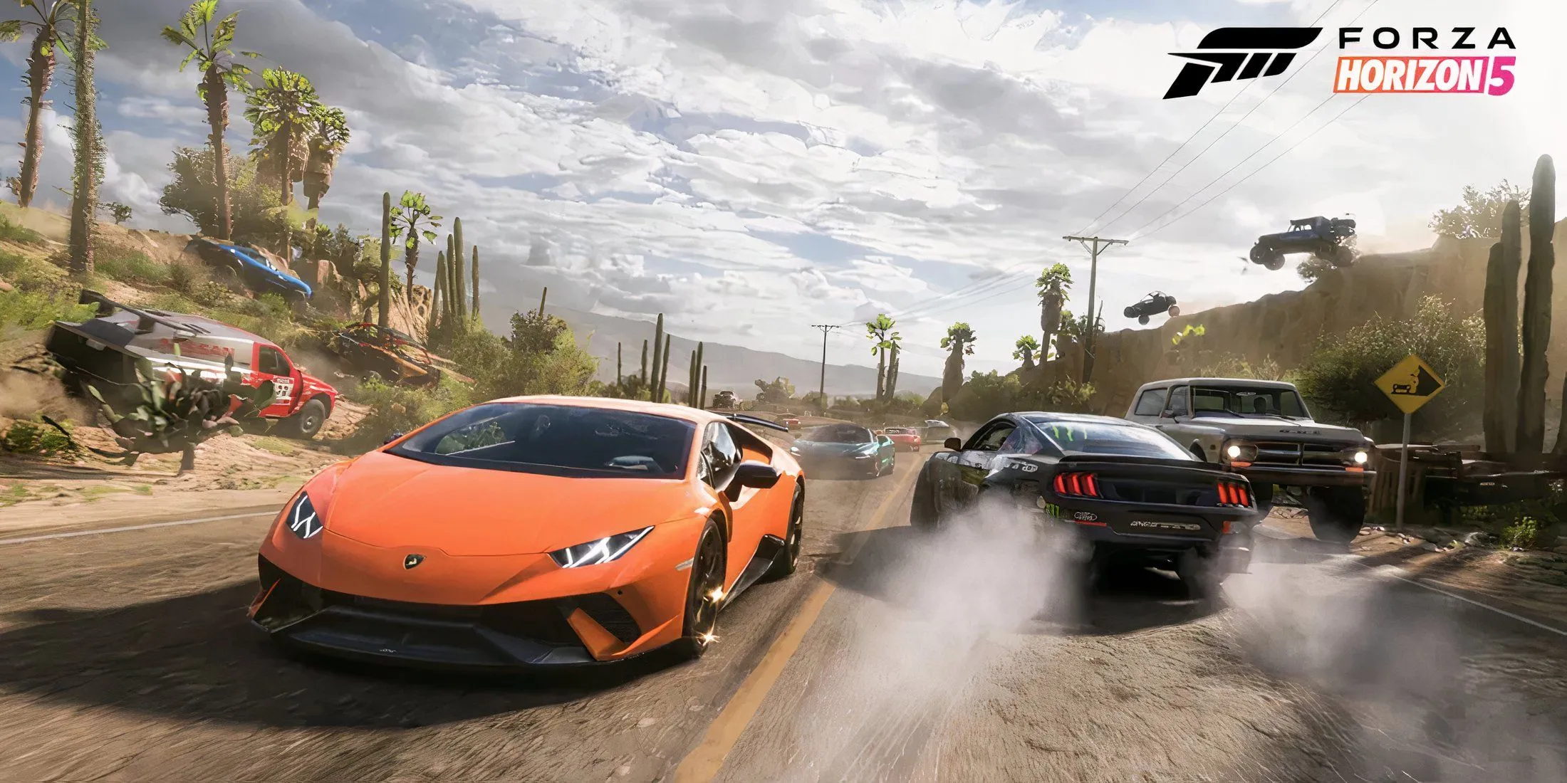 Chiếc xe thể thao chạy trên đường đua neon rực rỡ về đêm trong Forza Horizon 5